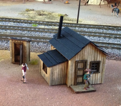 Mike and Debbie Foster - Zekes Cabin and outhouse