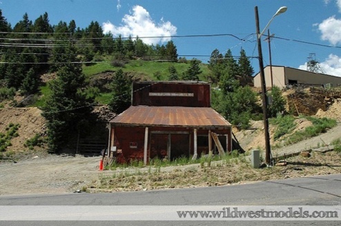 You can see a wagon or train grade to the back left, behind the mill