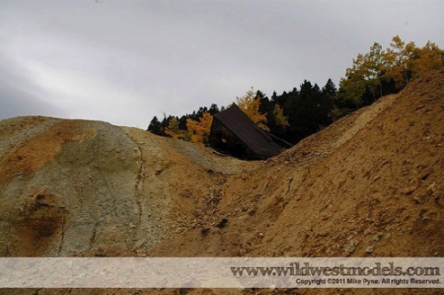 A view from an open shaft below the mine. The sunken valley leads right to the shaft of the Quartz Hill Mine. Possibly responsible for the mine’s collapse?